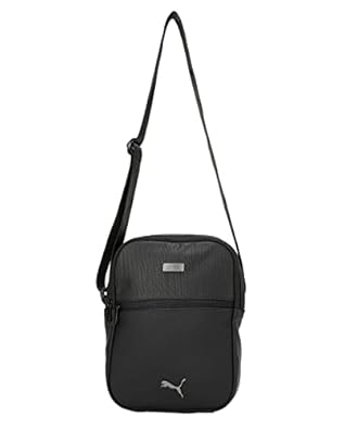 Side view of PUMA Unisex Lifestyle Gym Bag, showing its spacious compartments, adjustable shoulder strap, comfortable handles, and iconic PUMA logo, designed for gym and travel use.