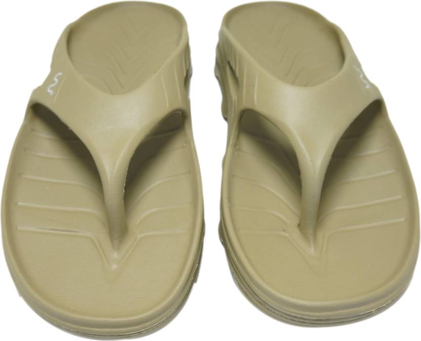 Doubleu Slipper displayed from various angles, featuring adjustable straps, cushioned footbed, and stylish design