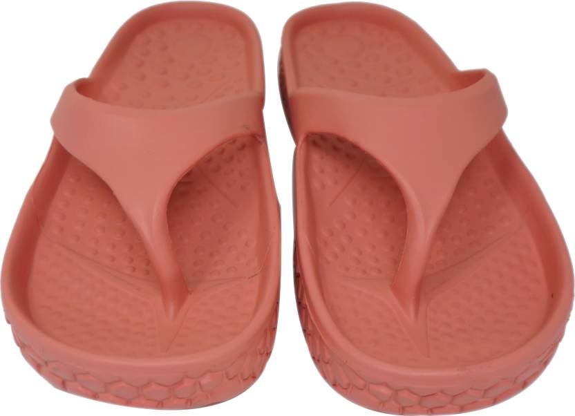 Doubleu Slipper displayed from various angles, featuring adjustable straps, cushioned footbed, and stylish design