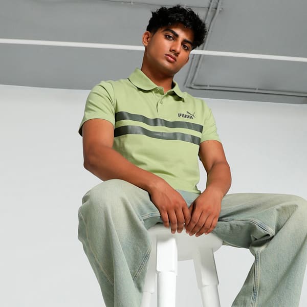 Front view of PUMA Men's Polo, showcasing the classic design, breathable fabric, and signature PUMA branding for a stylish and casual look.