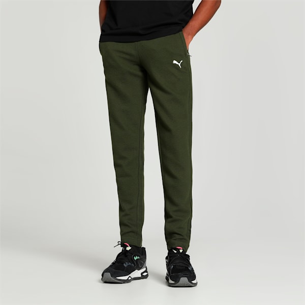 Side view of PUMA Men's Lower, showcasing its relaxed fit, breathable fabric, and signature PUMA logo for a casual, comfortable look.