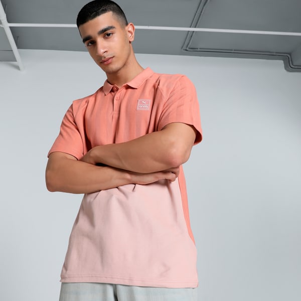 Front view of PUMA Men's Polo, showcasing the classic design, breathable fabric, and signature PUMA branding for a stylish and casual look.