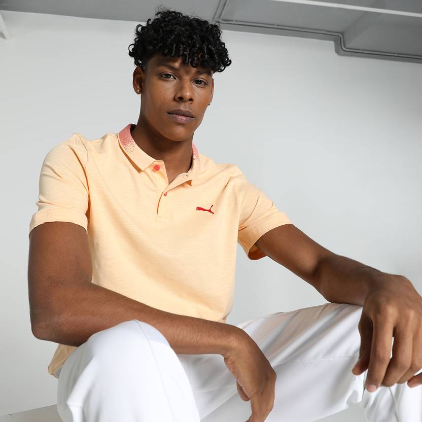 Front view of PUMA Men's Polo, showcasing the classic design, breathable fabric, and signature PUMA branding for a stylish and casual look.