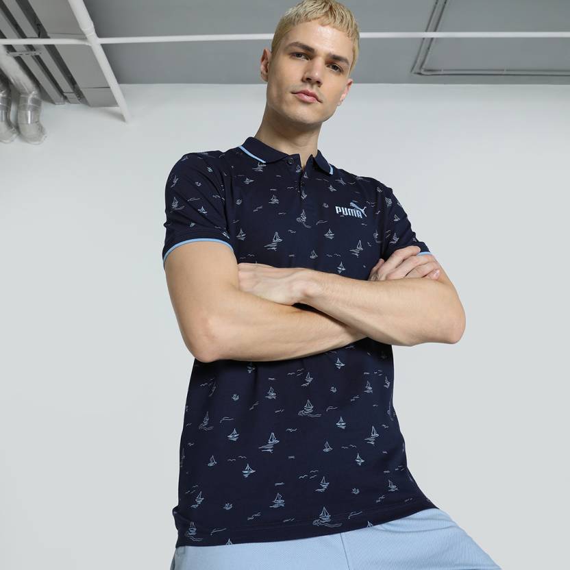 Front view of PUMA Men's Polo, showcasing the classic design, breathable fabric, and signature PUMA branding for a stylish and casual look.