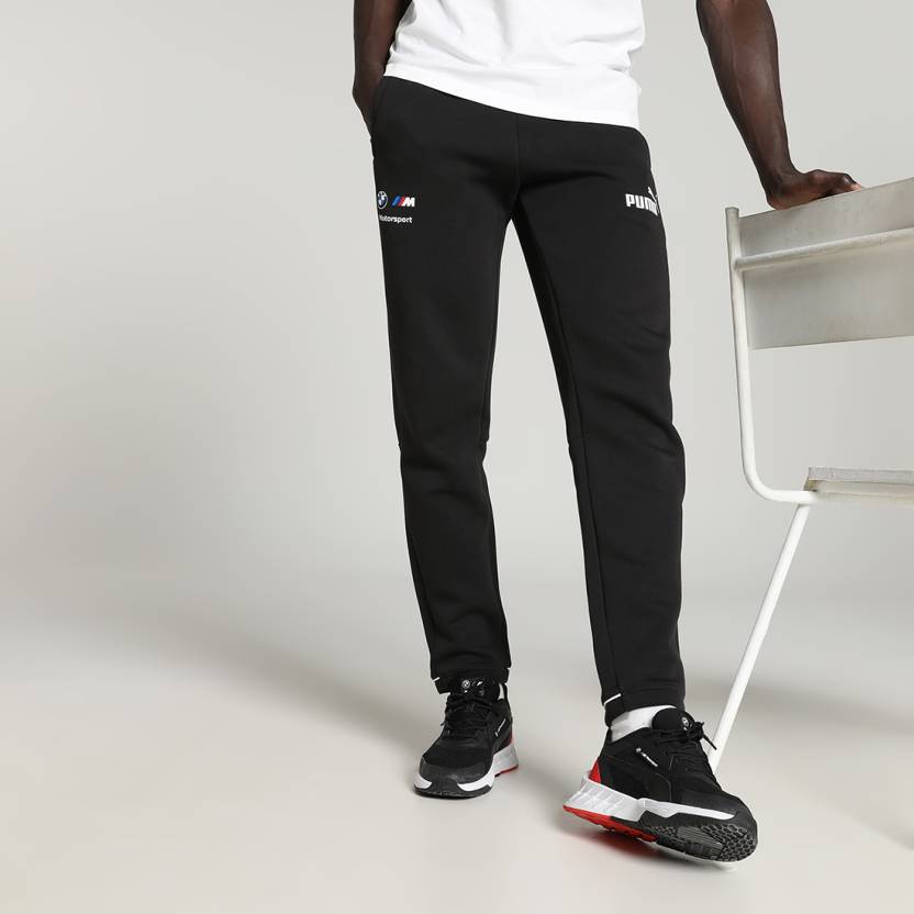 Side view of PUMA Men's Lower, showcasing its relaxed fit, breathable fabric, and signature PUMA logo for a casual, comfortable look.