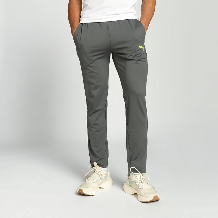 Side view of PUMA Men's Lower, showcasing its relaxed fit, breathable fabric, and signature PUMA logo for a casual, comfortable look.