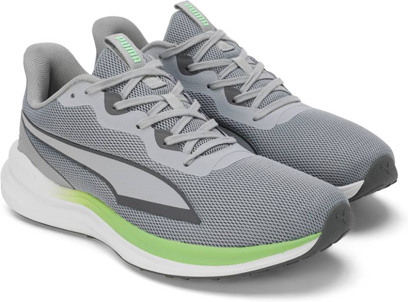 Side view of PUMA Men's Running Lace-Up Sneakers, showcasing the breathable upper, cushioned midsole, durable outsole, and iconic PUMA logo, designed for comfort and performance in running.