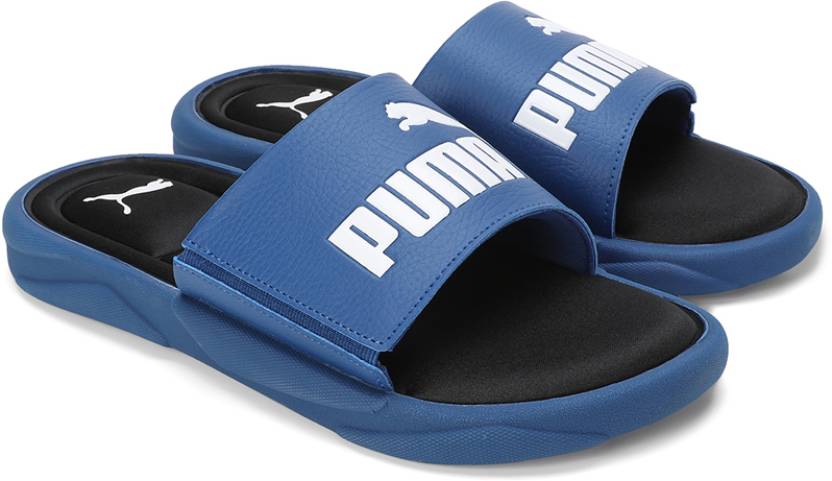 Side view of PUMA Men's Lifestyle Sandals, showcasing the adjustable straps, cushioned footbed, and iconic PUMA logo, designed for comfort and style in warm-weather activities.