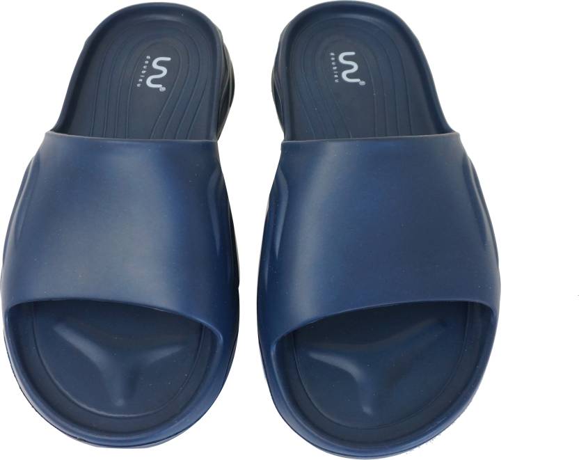 Doubleu Slide displayed from various angles, featuring adjustable straps, cushioned footbed, and stylish design