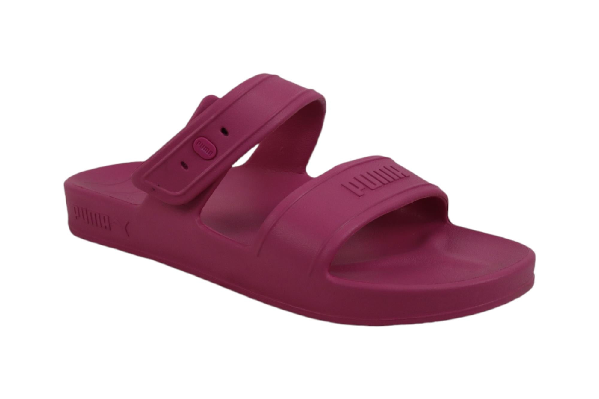 Side view of the PUMA Cooper Men Slipper, showcasing its soft cushioned footbed, minimalist upper with the PUMA logo, and durable rubber outsole.