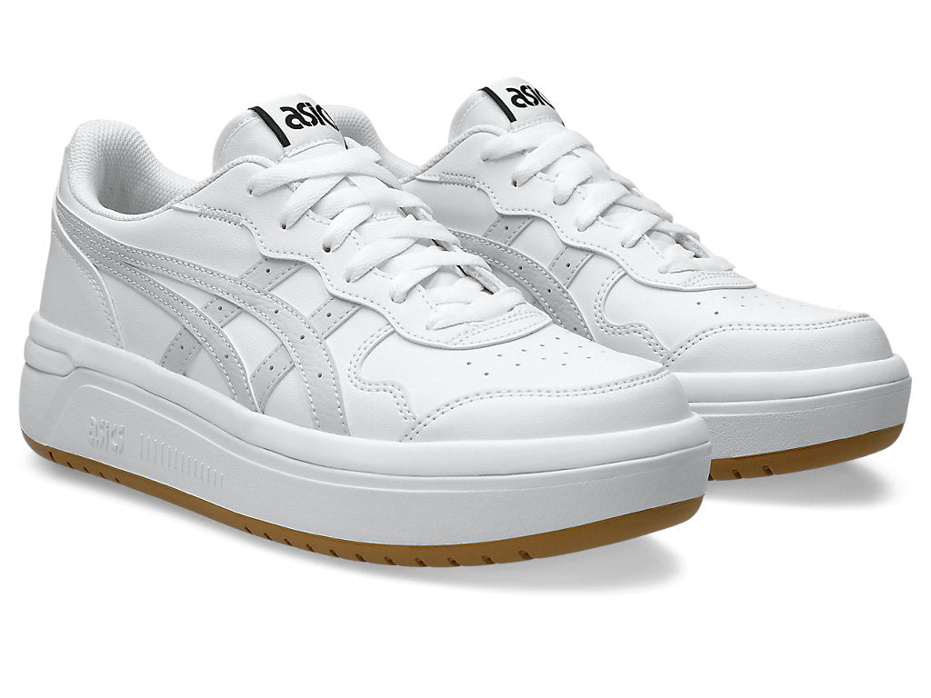 Side view showcasing the clean silhouette, lace-up detail, and textured outsole.