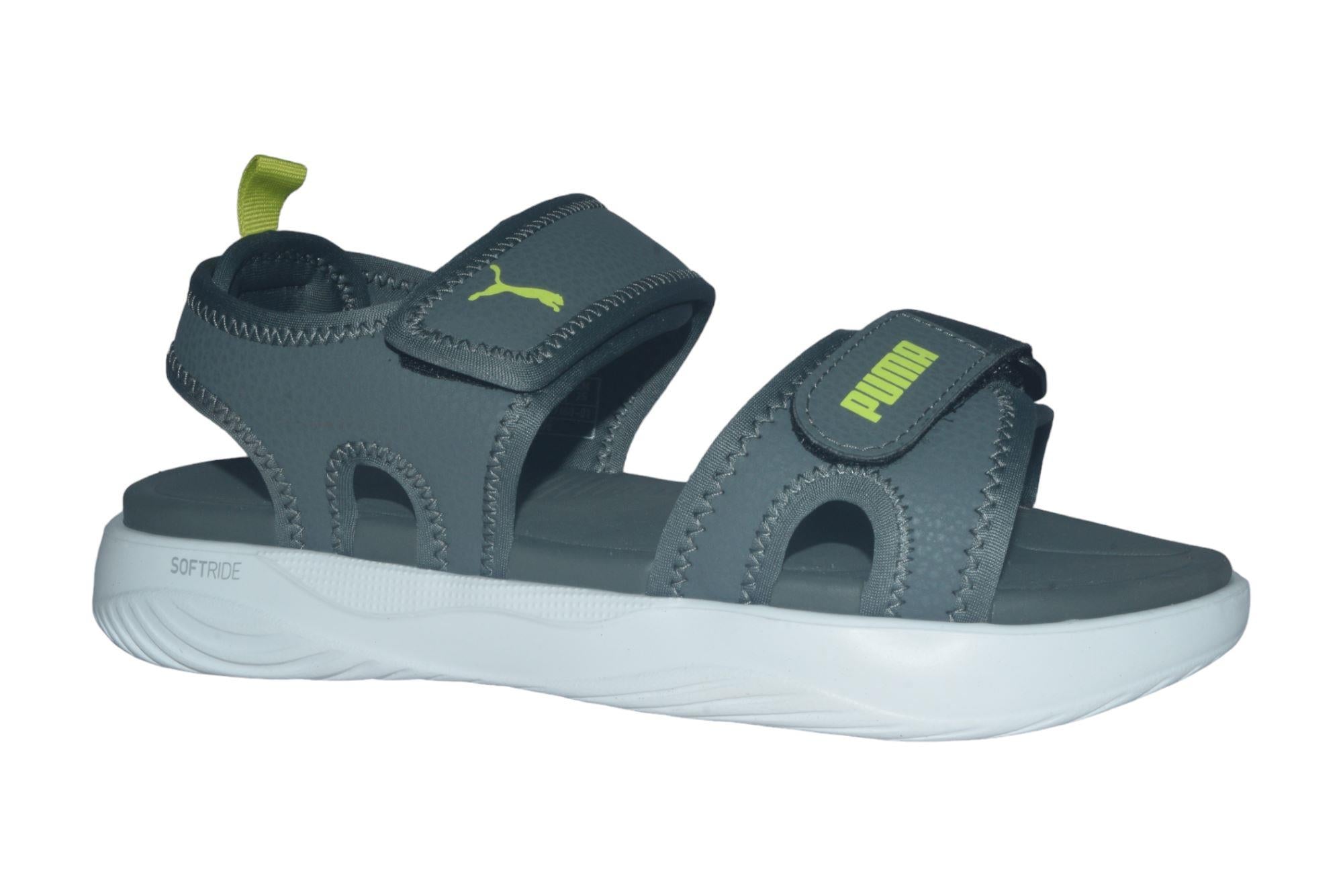 Side view of PUMA Men's Sandals, showcasing the adjustable straps, cushioned footbed, and iconic PUMA logo, designed for comfort and style in warm-weather activities.