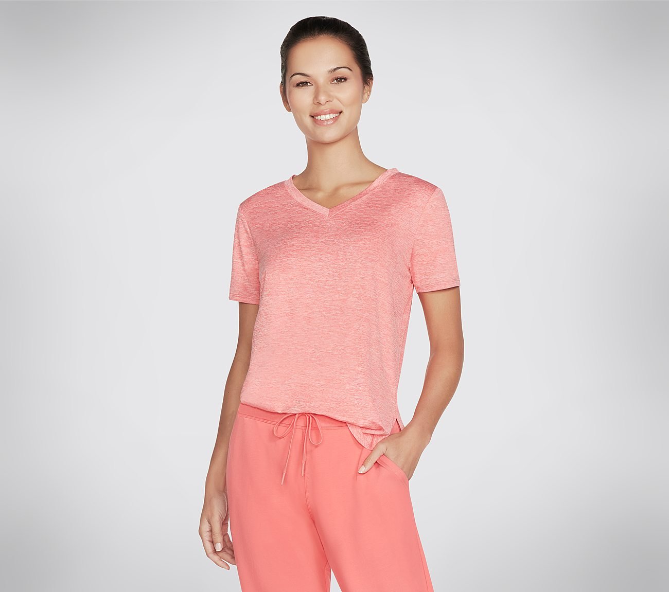 Front view of Skechers Diamond Blissful Tunic Polo showcasing its sleek design and diamond-inspired details