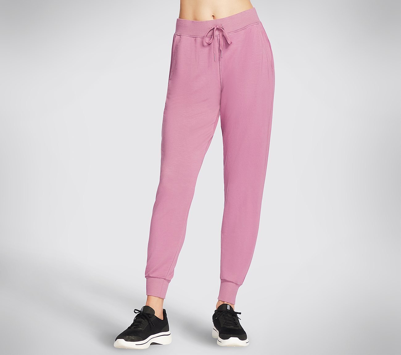 Side view of Skechers Restful Jogger WoMen's lower activewear showcasing relaxed fit and breathable design