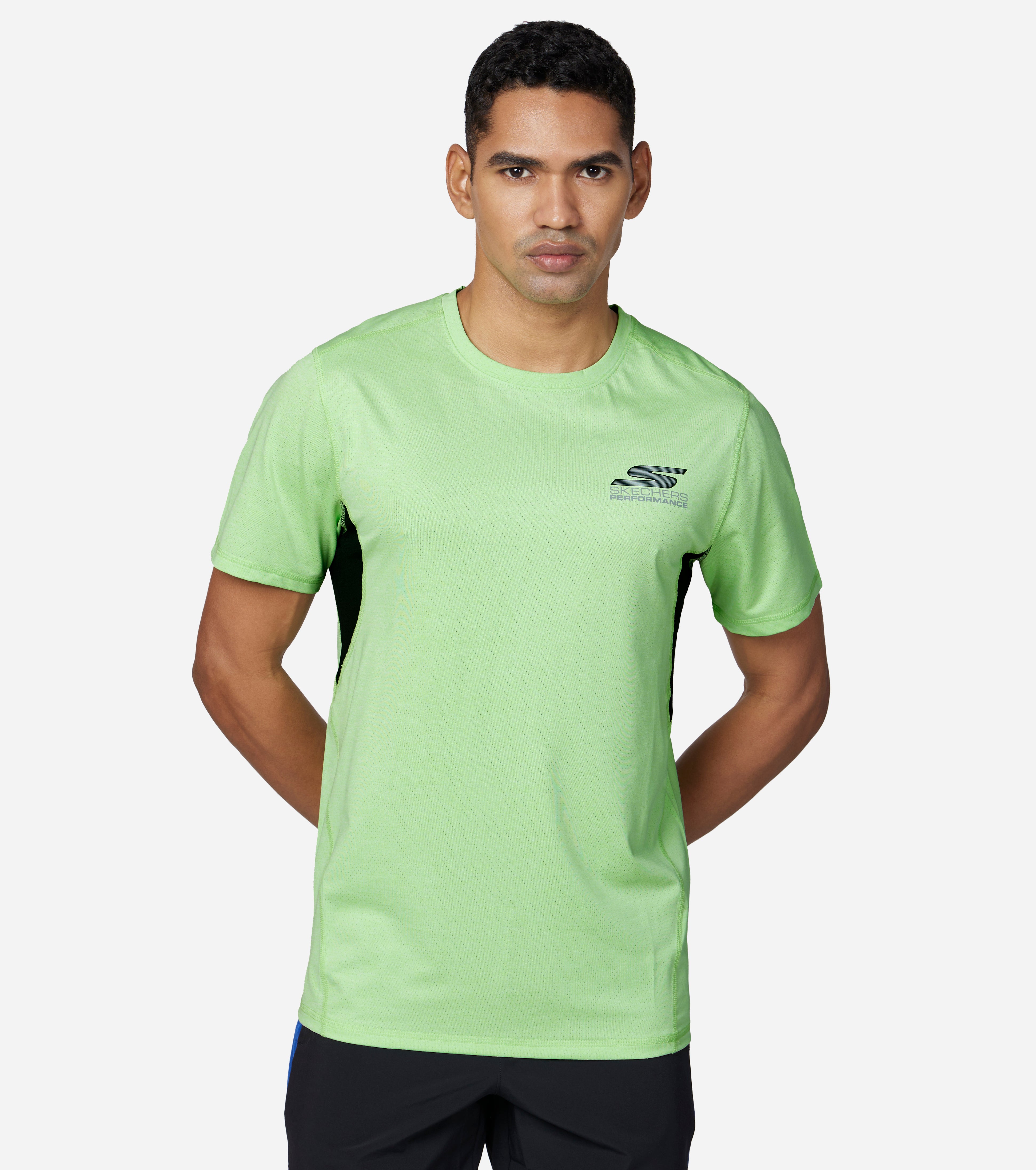 Side view of Skechers SkechAir Ultra SS Men's crew-neck tee with sleek design and breathable fabric