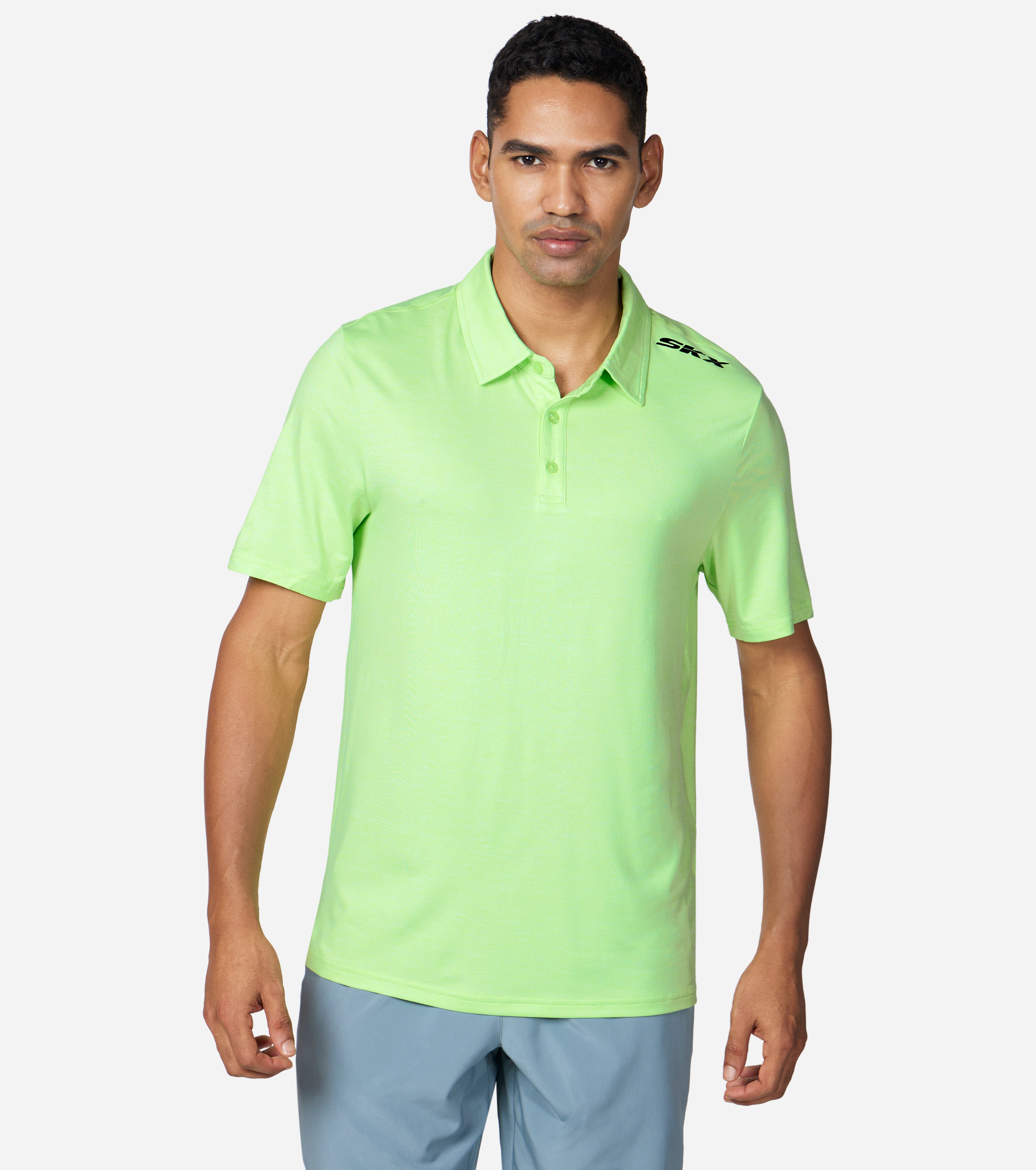 Side view of Skechers Godri Swift Men's polo featuring breathable fabric and modern, sleek design