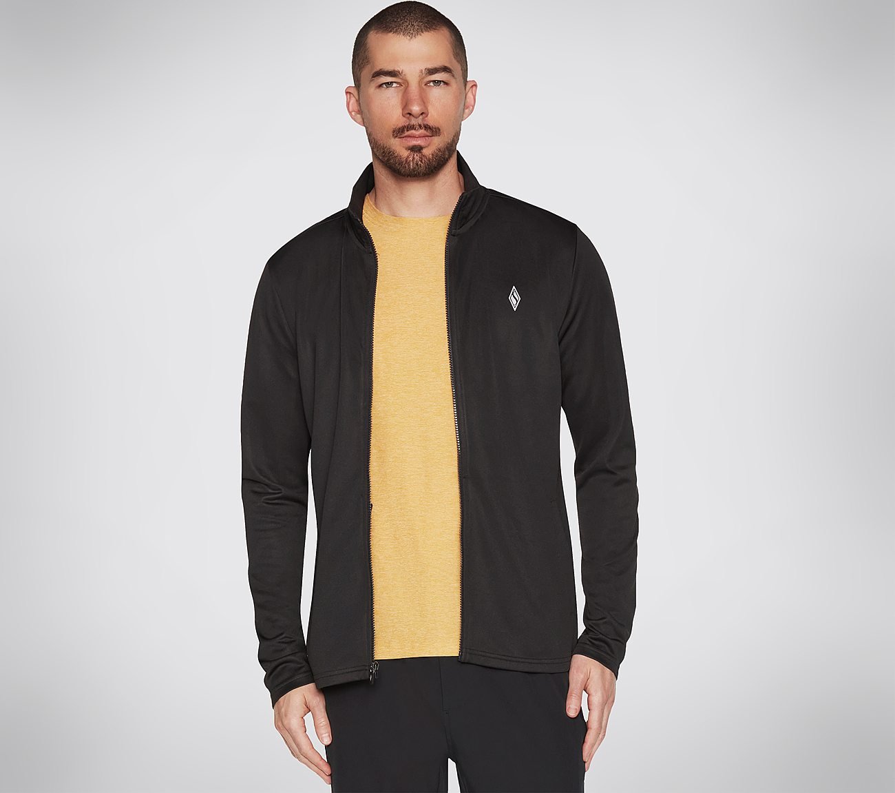 Sleek full-zip men’s jacket in high-performance fabric with a modern fit and clean finish