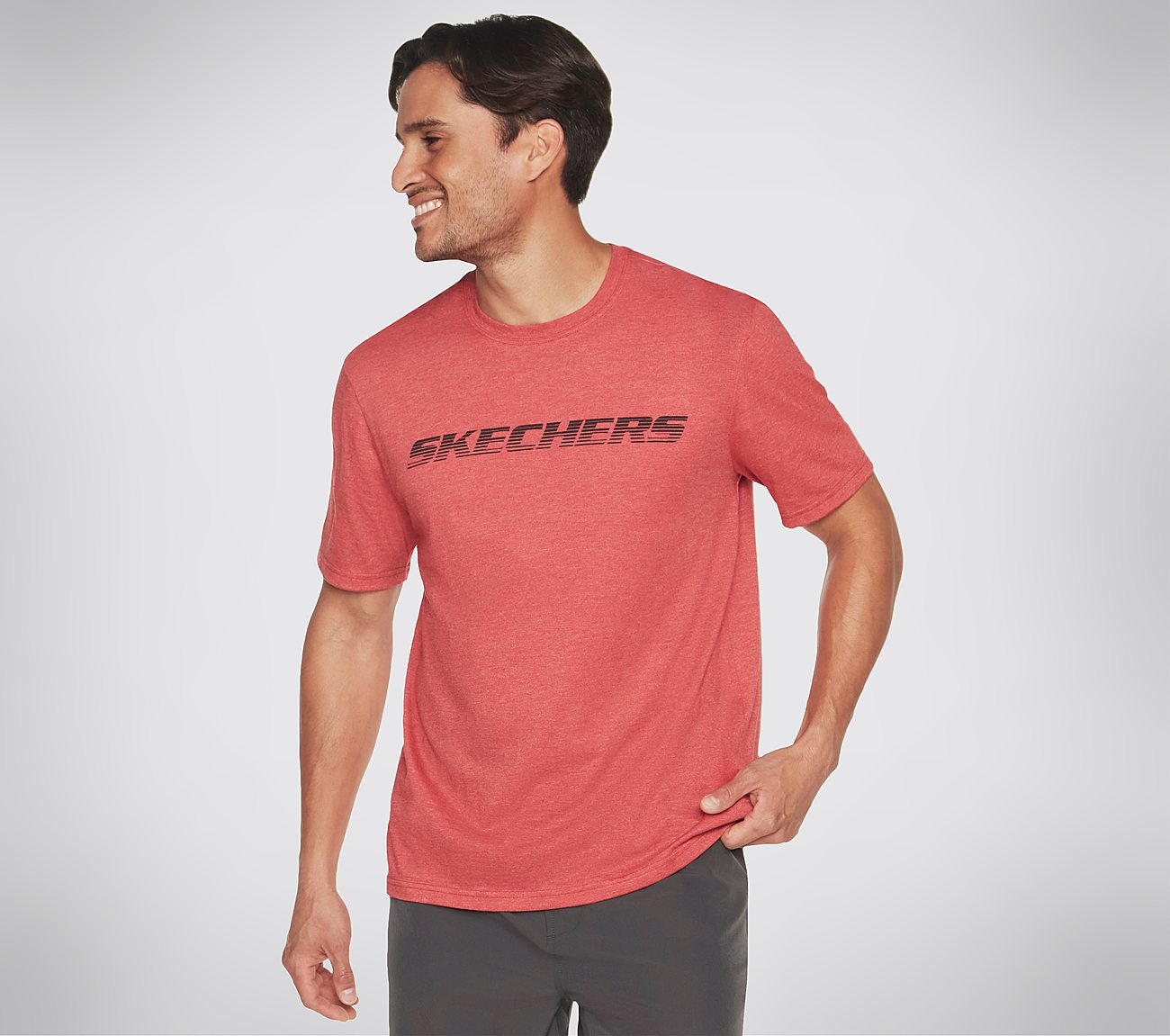 Side view of Skechers Motion Tee Men's crew-neck tee featuring breathable fabric and sleek design