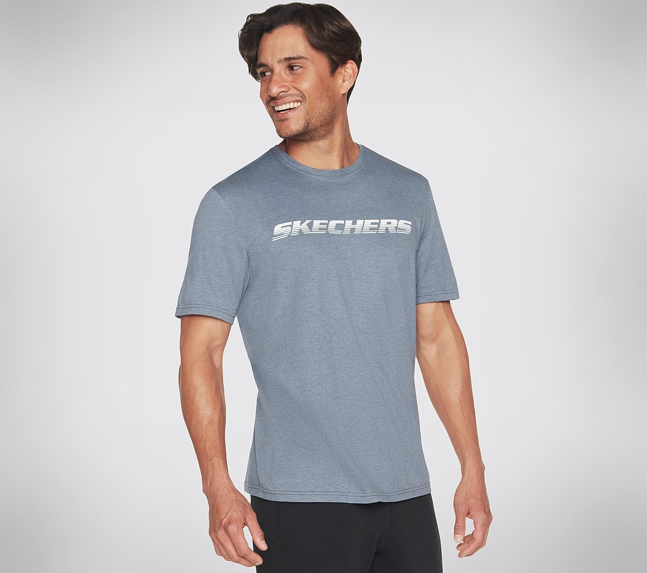 Side view of Skechers Motion Tee Men's crew-neck tee featuring breathable fabric and sleek design