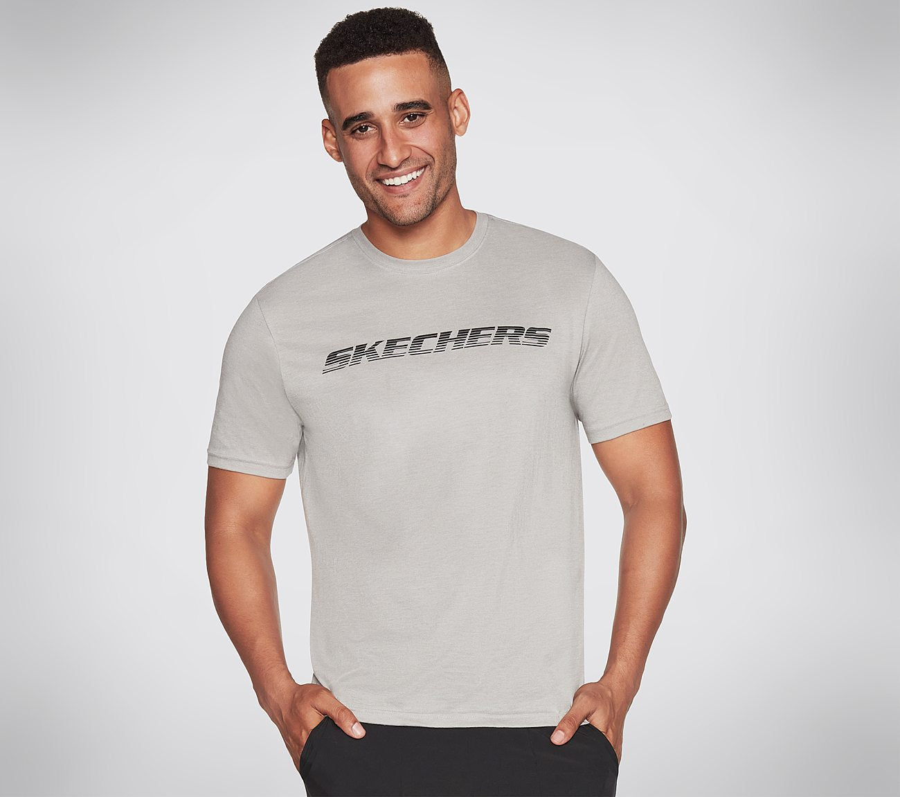 Side view of Skechers Motion Tee Men's crew-neck tee featuring breathable fabric and sleek design