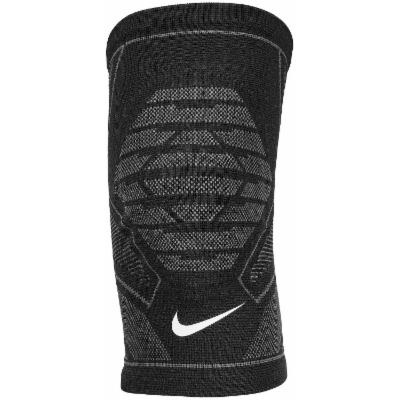 The image shows a unisex Nike knee sleeve snugly fitted on a knee, emphasizing its supportive and flexible design.