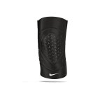 The image shows a unisex Nike knee sleeve snugly fitted on a knee, emphasizing its supportive and flexible design.