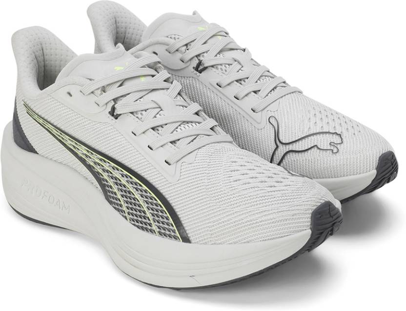 Side view of PUMA Men's Lifestyle Lace-Up Sneakers, showcasing the sleek design, breathable upper, cushioned insole, and iconic PUMA logo, designed for comfort and style in everyday wear.