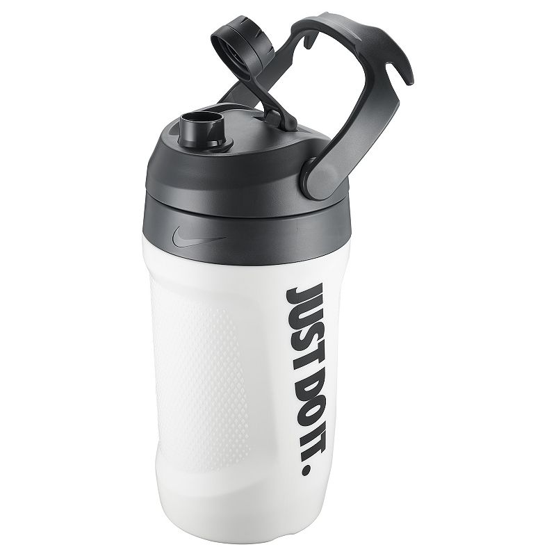 The image shows a large-capacity unisex Nike sipper bottle jug with a spill-proof cap, designed for easy hydration during workouts or outdoor activities.