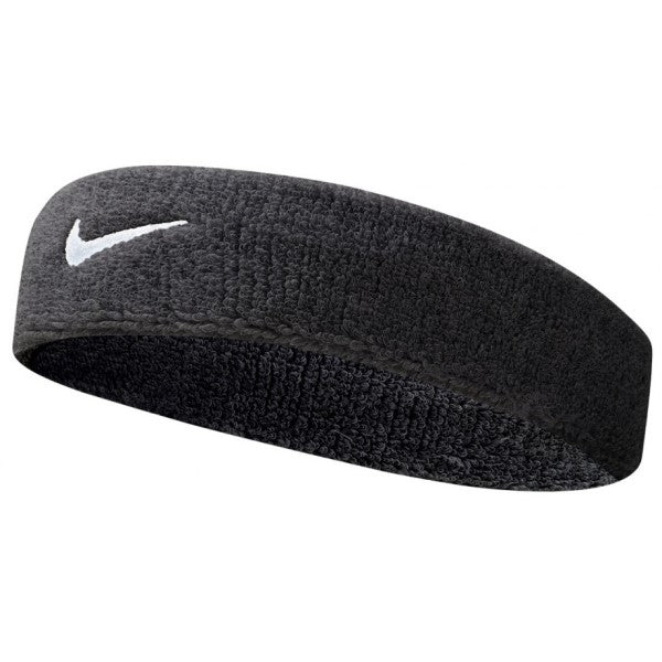 The image shows a unisex Nike headband worn on the head, showcasing its sleek, functional design and secure fit.