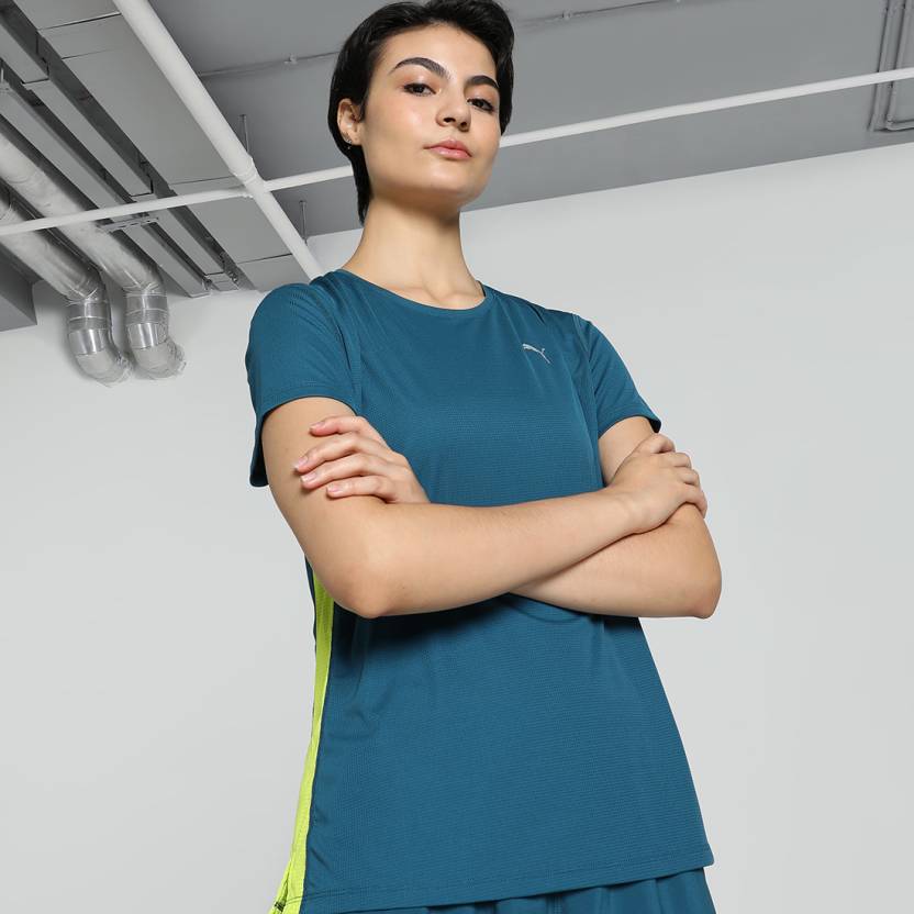 Front view of PUMA Women's Running Crew, showcasing the breathable fabric, relaxed fit, and signature PUMA logo for a comfortable, stylish activewear look.