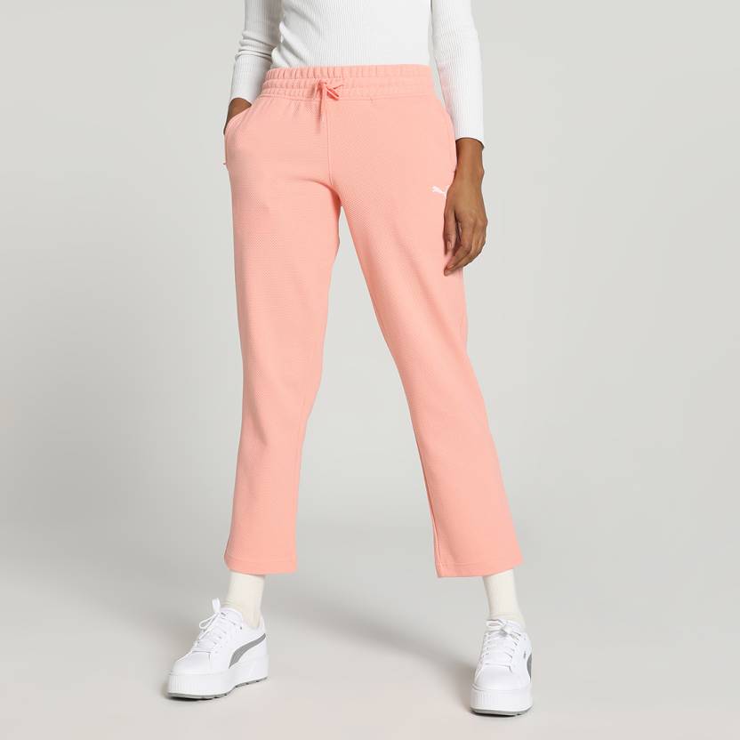 Side view of PUMA Women's Lower, highlighting the relaxed fit, soft fabric, and signature PUMA logo, perfect for casual wear and lifestyle activities.