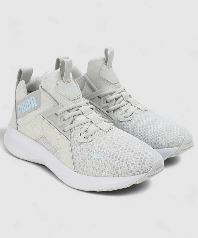 Side view of PUMA Women's Running Lace-Up Sneakers, showcasing the breathable upper, cushioned midsole, durable outsole, and iconic PUMA logo, designed for comfort and performance in running.