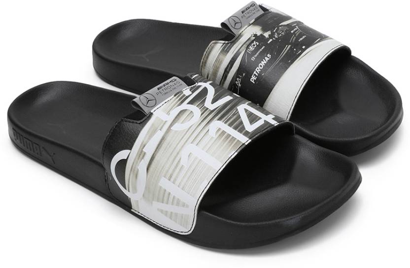 Side view of PUMA Men's Lifestyle Sandals, showcasing the adjustable straps, cushioned footbed, and iconic PUMA logo, designed for comfort and style in warm-weather activities.