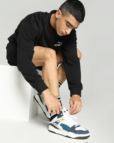 Side view of PUMA Men's Lifestyle Lace-Up Sneakers, showcasing the sleek design, breathable upper, cushioned insole, and iconic PUMA logo, designed for comfort and style in everyday wear.