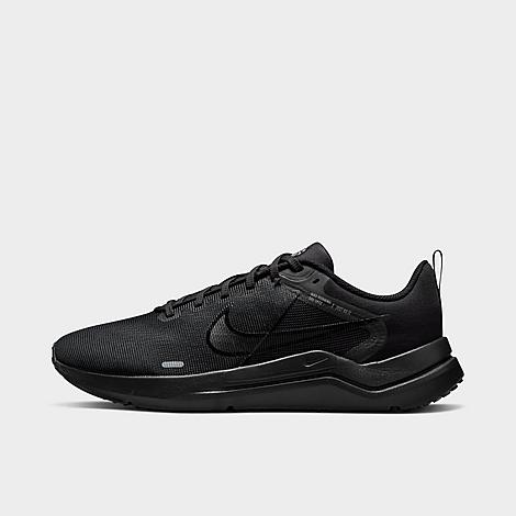 The image shows a pair of men’s Nike running shoes, emphasizing their sleek, lightweight design and supportive sole.