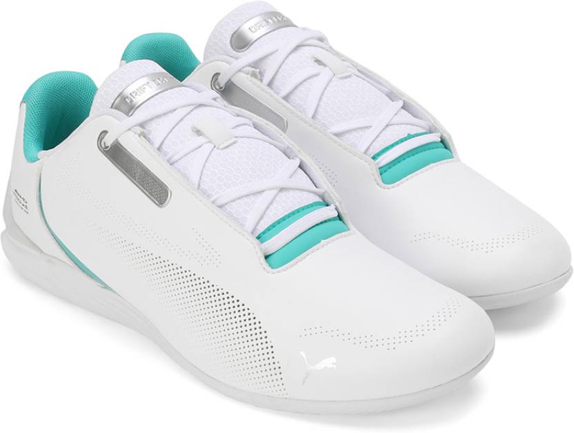 Side view of PUMA Men's Lifestyle Lace-Up Sneakers, showcasing the sleek design, breathable upper, cushioned insole, and iconic PUMA logo, designed for comfort and style in everyday wear.