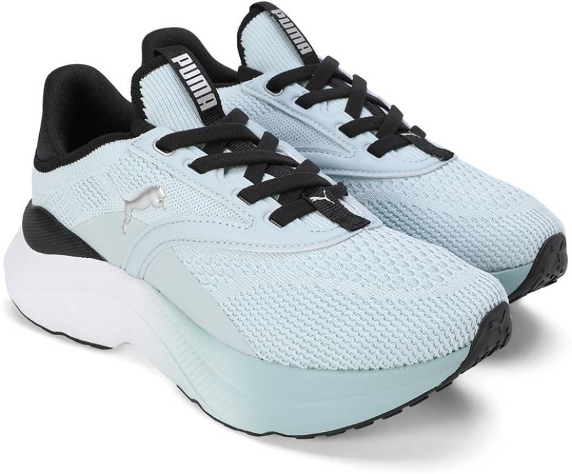 Side view of PUMA Women's Lifestyle Lace-Up Sneakers, showcasing the sleek design, breathable upper, cushioned insole, and iconic PUMA logo, designed for comfort and style in everyday wear.