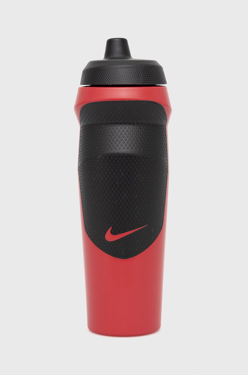 The image shows a sleek, unisex Nike soft plastic sipper with a spill-proof lid, featuring a lightweight design and the Nike logo.