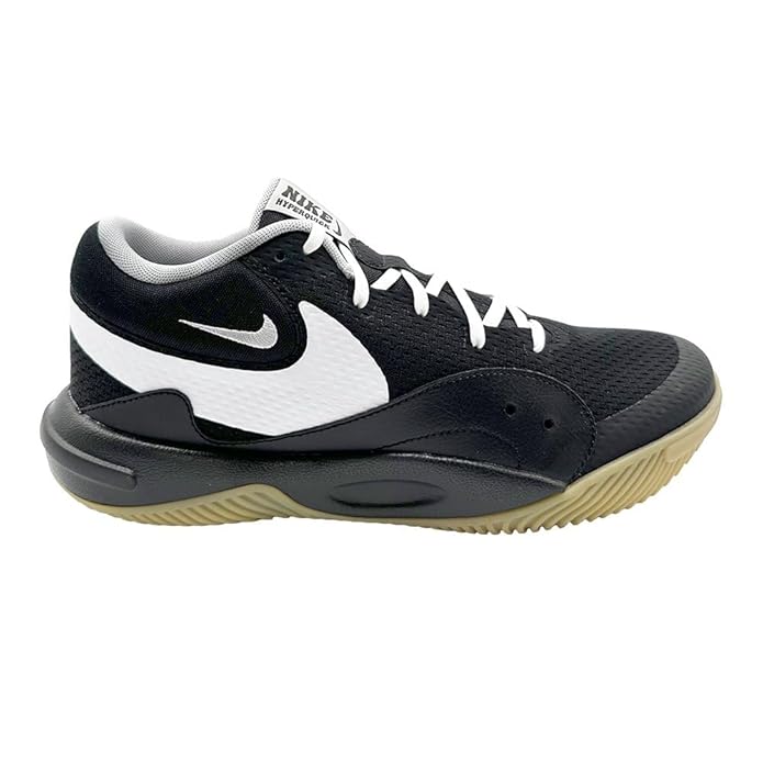 A side-angle view of Nike HyperQuick indoor unisex footwear showcasing the breathable upper responsive cushioning and durable outsole designed for court performance placed on a clean background.