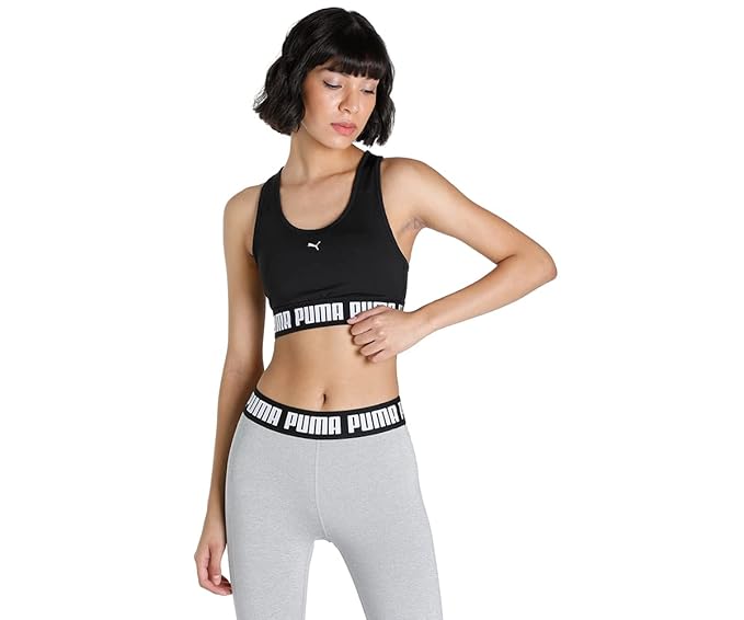 Front view of PUMA Women's Running Bra Top, showcasing the moisture-wicking fabric, supportive design, and iconic PUMA logo for a stylish, performance-driven look.