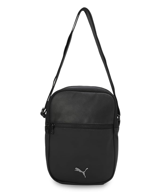 Side view of PUMA Men's Lifestyle Duffle Bag, showcasing the spacious compartments, adjustable shoulder strap, sturdy handles, and iconic PUMA logo, designed for both style and practicality.