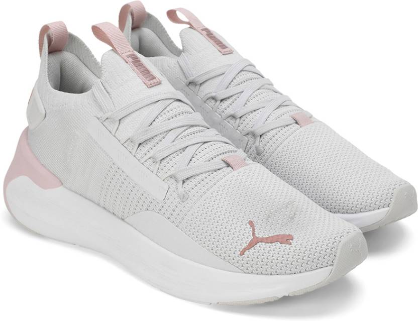 Side view of PUMA Women's Lifestyle Lace-Up Sneakers, showcasing the sleek design, breathable upper, cushioned insole, and iconic PUMA logo, designed for comfort and style in everyday wear.