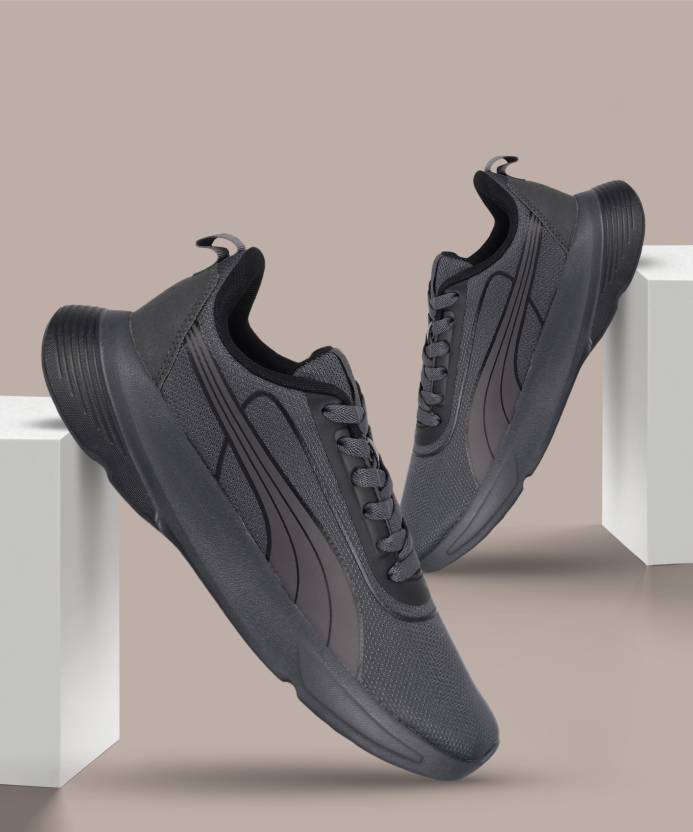 Side view of PUMA Men's Lifestyle Lace-Up Sneakers, showcasing the sleek design, breathable upper, cushioned insole, and iconic PUMA logo, designed for comfort and style in everyday wear.