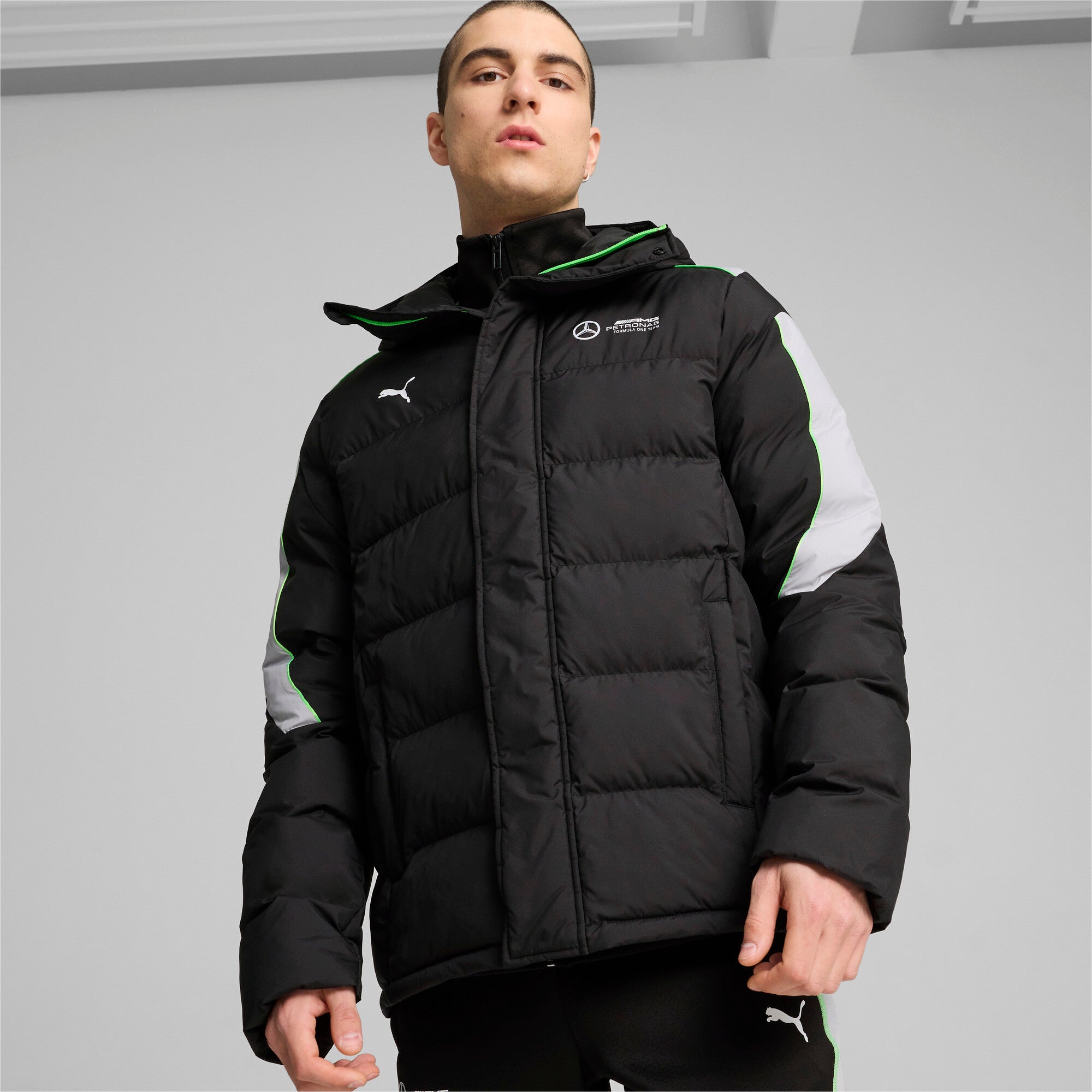 Front view of PUMA Men's Winter Jacket, highlighting the insulated design, sleek fit, and signature PUMA logo, ideal for cold-weather wear.