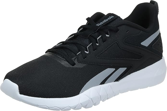 A side view of the Reebok Flexagon Energy TR 4 showcasing its breathable mesh upper, cushioned midsole, and flexible grooved outsole, perfect for versatile training.