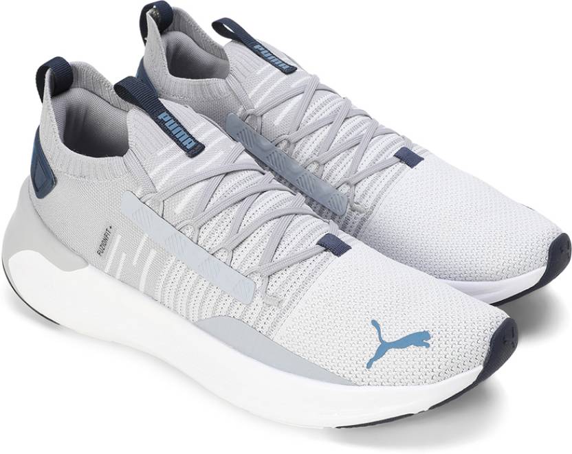 Side view of PUMA Men's Lifestyle Lace-Up Sneakers, showcasing the sleek design, breathable upper, cushioned insole, and iconic PUMA logo, designed for comfort and style in everyday wear.