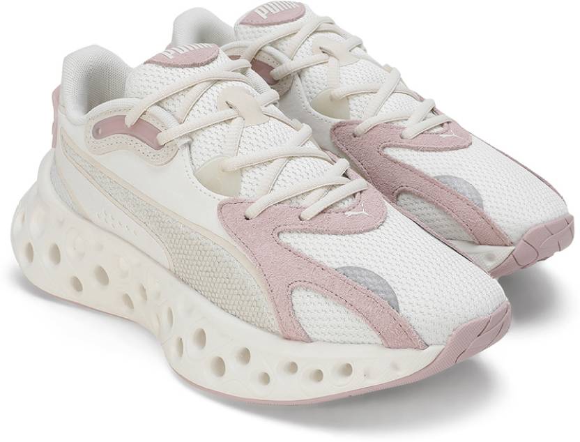 Side view of PUMA Women's Lifestyle Lace-Up Sneakers, showcasing the sleek design, breathable upper, cushioned insole, and iconic PUMA logo, designed for comfort and style in everyday wear.