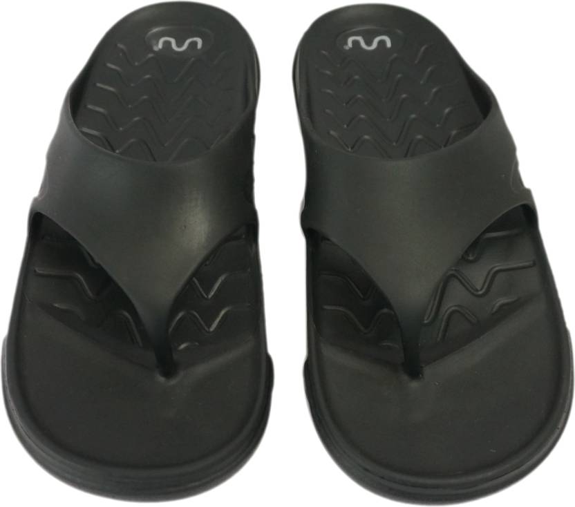 Doubleu Slipper displayed from various angles, featuring adjustable straps, cushioned footbed, and stylish design