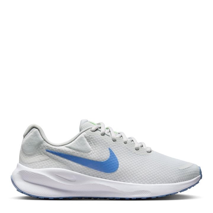 The image shows a pair of Women’s Nike running shoes, emphasizing their sleek, lightweight design and supportive sole.