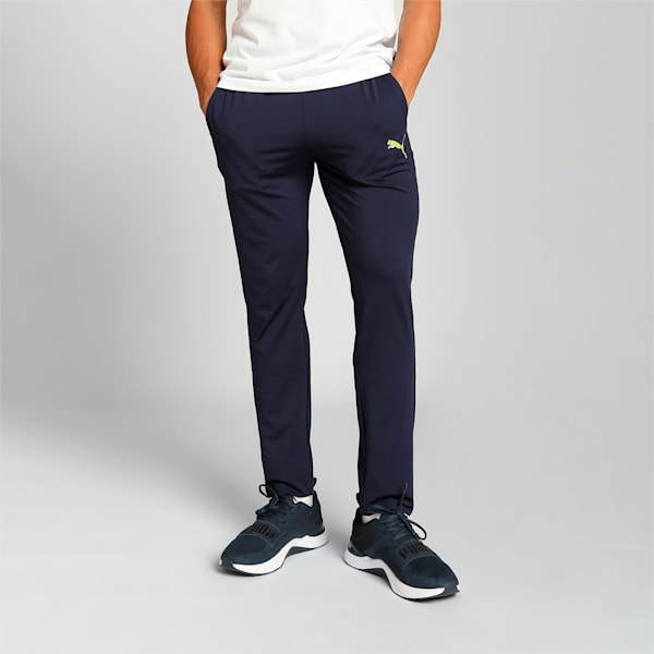 Side view of PUMA Men's Lower, showcasing its relaxed fit, breathable fabric, and signature PUMA logo for a casual, comfortable look.